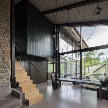 Porro - The Ferro table for a dining room immersed in the landscape