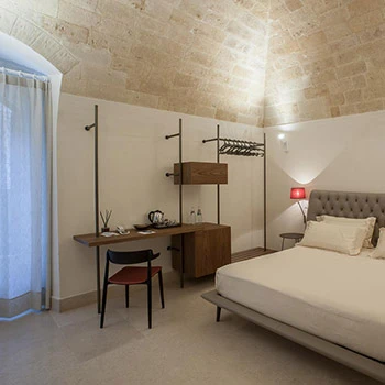 Porro, image:contract_immagini - Porro Spa - Porro’s design purity for the Quarry Resort in Matera