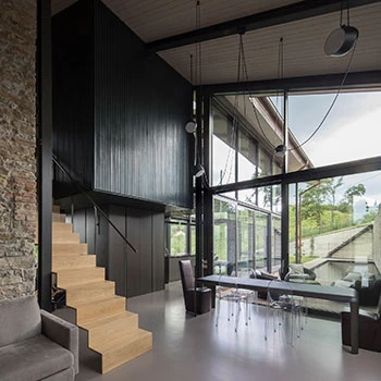 Porro, image:contract_immagini - Porro Spa - The Ferro table for a dining room immersed in the landscape