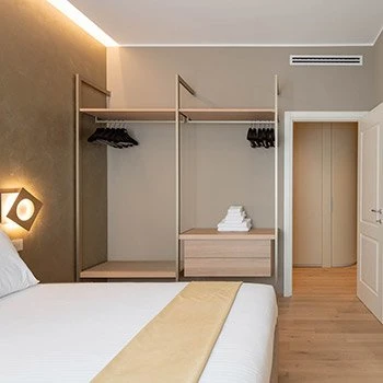 Porro, image:contract_immagini - Porro Spa - Porro’s design enhances the new Heart Milan Apartments Duomo Missori