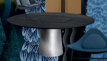 Porro - The stainless steel Materic table on Elle Decor Italia cover