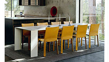Porro - The Metallico table  in the Lookout House featured by AD Italia
